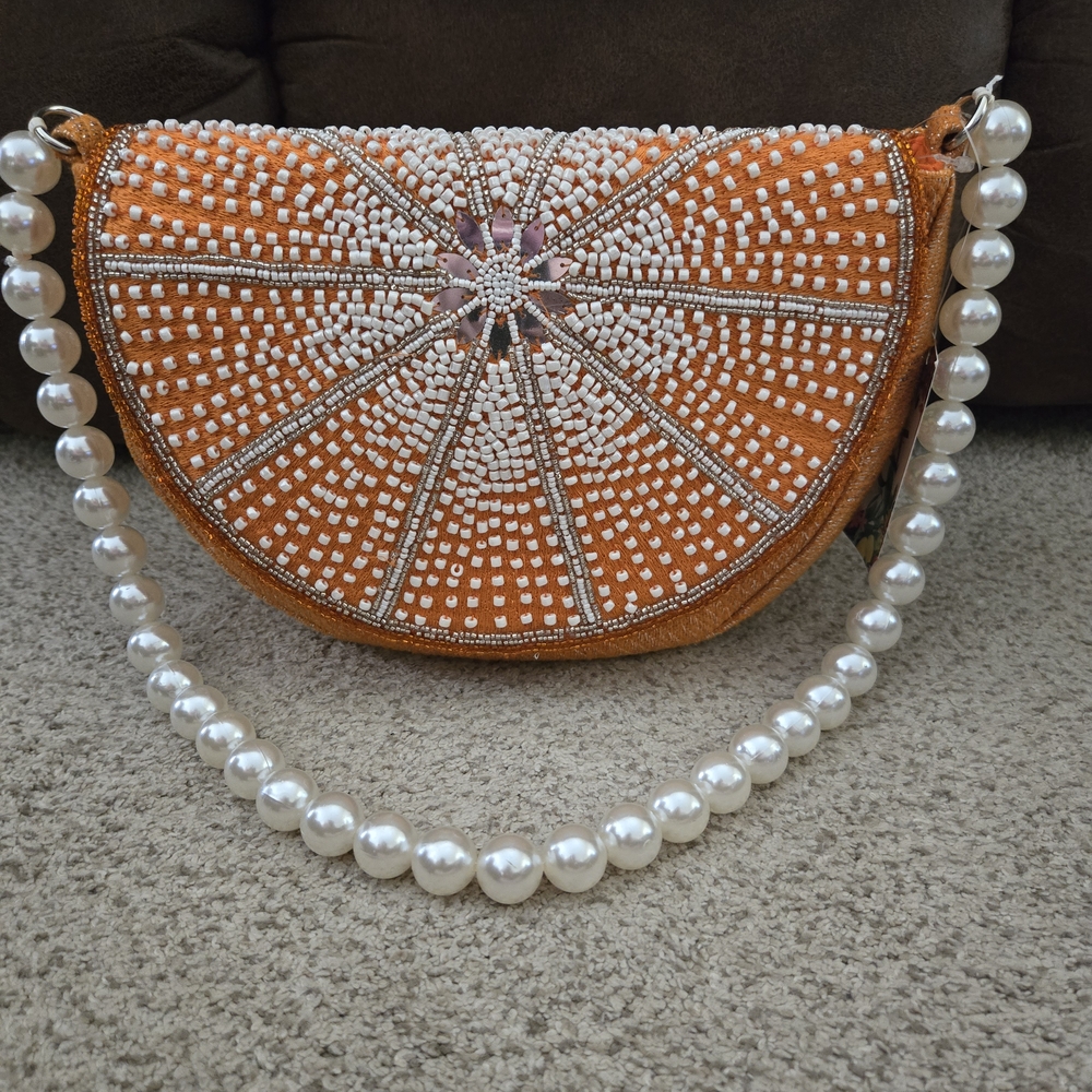 Orange and White Shoulder Bag with Pearl Strap and Decorative Pattern